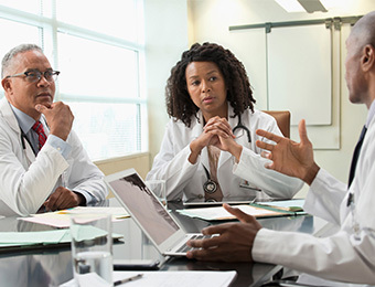 Diverse group of doctors in discussion